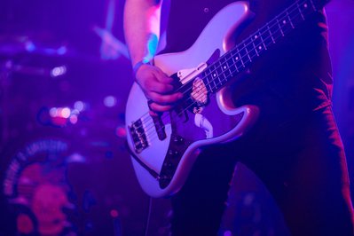 Guitar solos frozen in time through expert rock music photography.