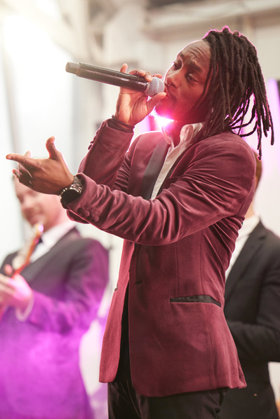 High-energy concert photography in NYC, highlighting musicians in action.
