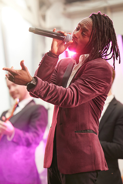 High-energy concert photography in NYC, highlighting musicians in action.
