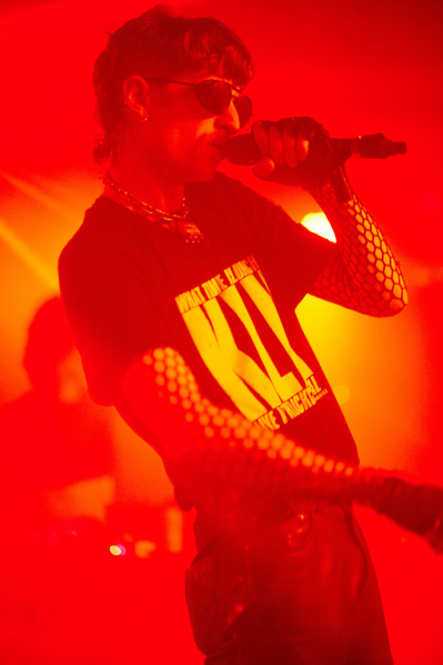 Electrifying moments of crowd interaction captured in rock photography.