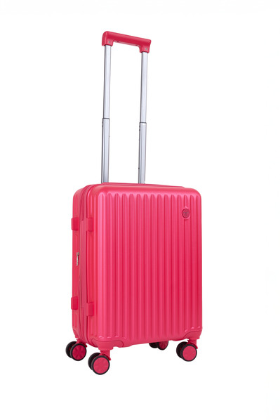 NYC luggage product photographer showcasing sleek carry-on suitcase in studio.
