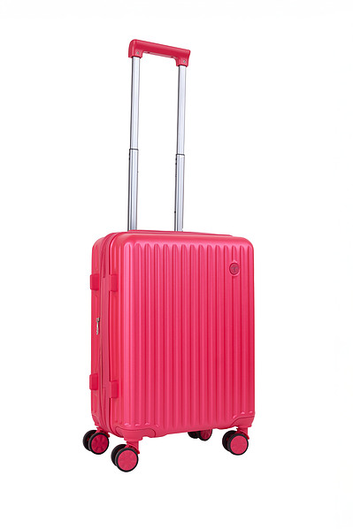 NYC luggage product photographer showcasing sleek carry-on suitcase in studio.