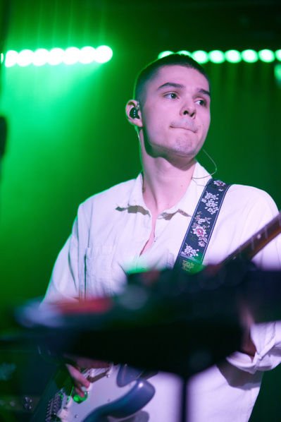 Energetic live performances documented in NYC's music venues.