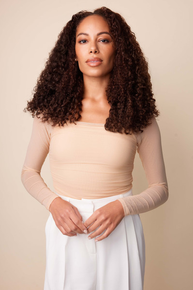 Models in NYC Bebonia studio campaign featuring natural, bouncy curly hair extensions.