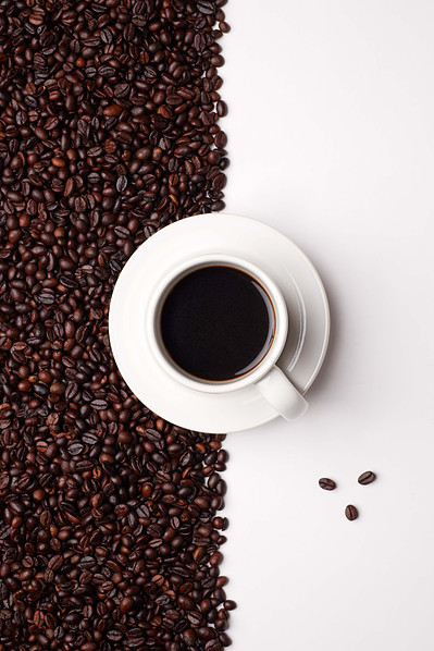 NYC coffee photographer capturing espresso pour for café branding visuals.