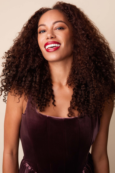 Bebonia NYC studio campaign featuring models with full, defined curly hair extensions.