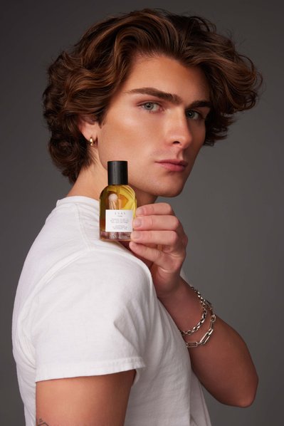 Luxury beauty brand campaign photography featuring skincare products with elegant lighting and styling.