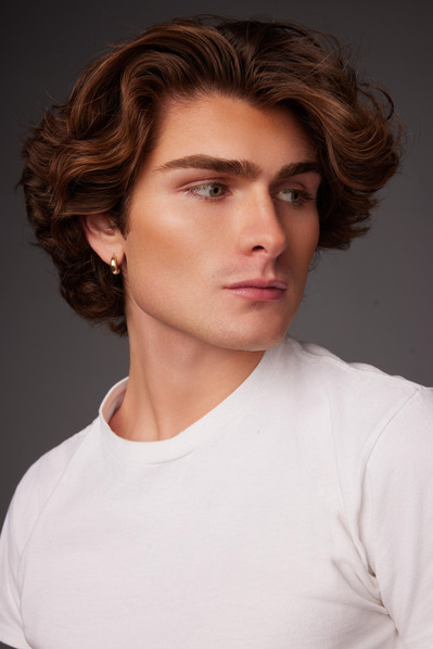 Studio photoshoot for Esas NYC emphasizing wellness-focused beauty products with modern styling.
