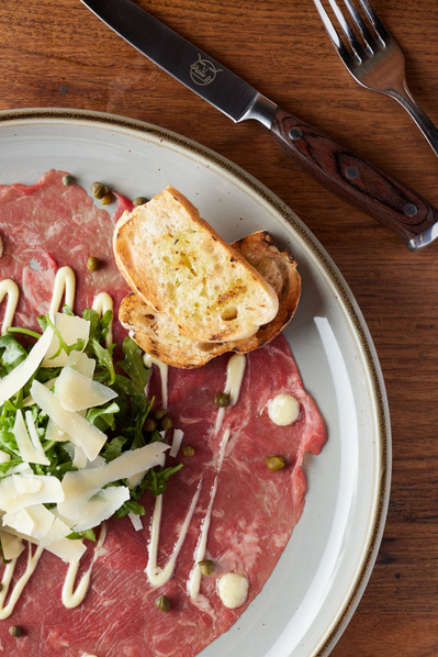 Food and drink pairing image for NYC wine bar menu.