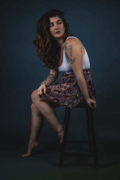 Studio photographer in NYC updating portfolios for aspiring and professional models.