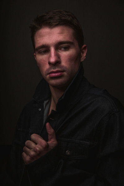 NYC fashion photographer updating model portfolios with dynamic studio shots.