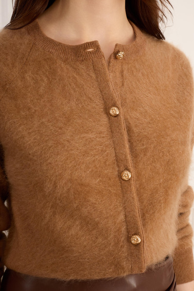 Close-up fabric detail of women’s fashion garment for NYC ecommerce brand.