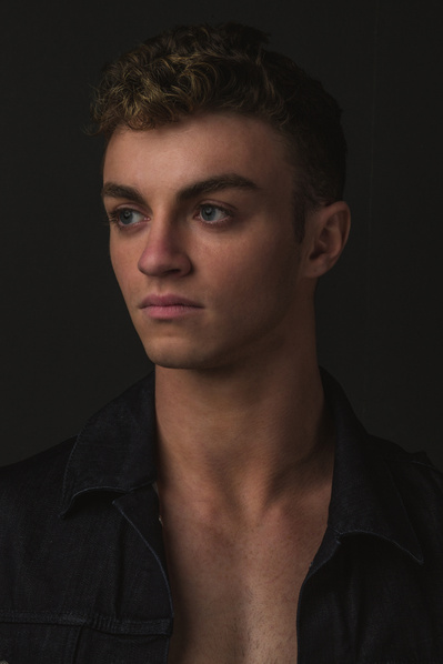 NYC studio photographer updating professional model portfolios with high-quality images.