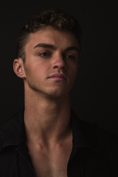 Studio photoshoot for model portfolio updates in NYC, featuring diverse poses and styles.