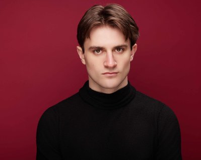 Actor headshot session in New York City with professional studio lighting setup. Blaine Pennington Photography.