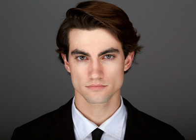 Let your personality shine through in your professional headshot against the backdrop of bustling New York City.