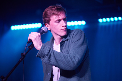 Intense rock vocalist portraits against NYC's urban backdrop.