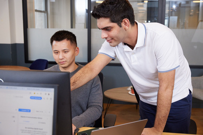 Candid office moments in NYC corporate lifestyle photography for website and marketing.