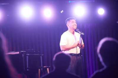 Aaron J Albano performaning at Green Room 42. Photography by Blaine Pennington.