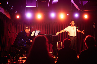 Aaron J Albano performaning at Green Room 42. Photography by Blaine Pennington.