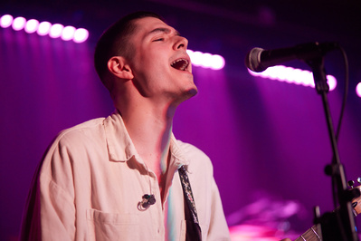 Artistic close-ups of musicians in the midst of performance.