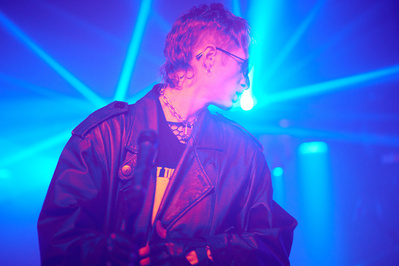 Energetic live performances documented in NYC's music venues.