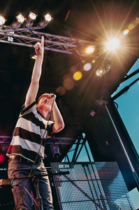 Matt Johnson pointing out to the crowd while performing in the 2010 Siren Festival