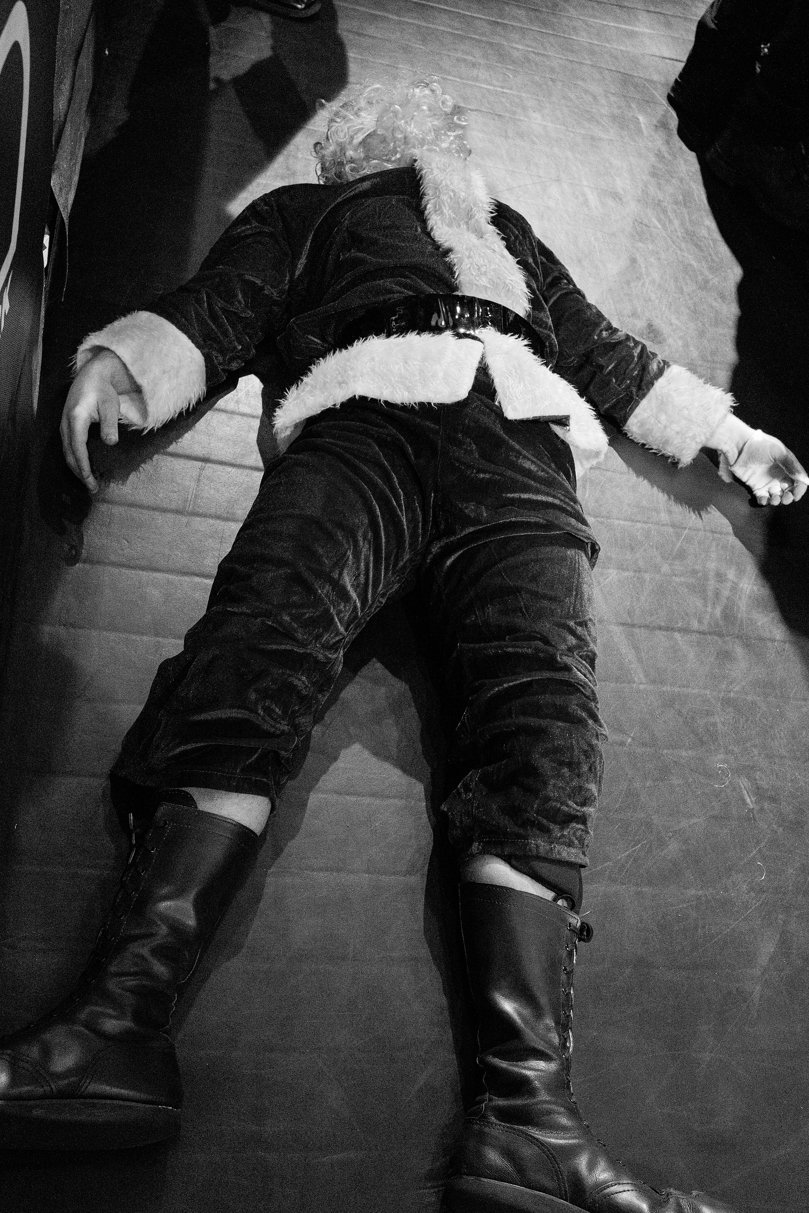 Santa Claus knocked out in a wrestling match from House of Glory, Revelation. 