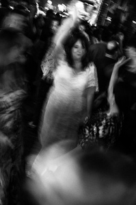 a bride partying on the dance floor during her wedding, London England