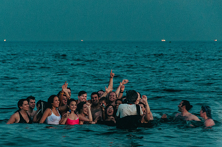​Matt Johnson from Matt and Kim in the water with some of his fans - Village Voice Siren Festival, Coney Island, Brooklyn, 2010