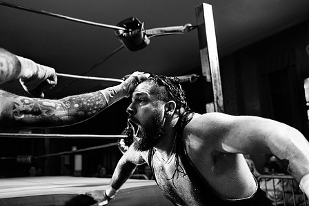 Bear Bronson facing down a fist outside of the wrestling ring. He&#x27;s about to get it between the eyes. Where Brooklyn At?&quot; Bay Ridge  In Brooklyn, October 2022