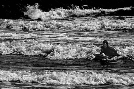 ​Body surfer riding it out to the shore. Rockaway Beach Queens.