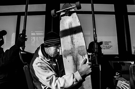 ​Long boarder on the Q35 bus, headed to Brooklyn from Rockaway Beach Queens.