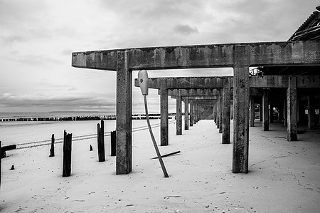 Boardwalk destroyed by Hurricane Sandy in Rockaway Beach Queens, NY.