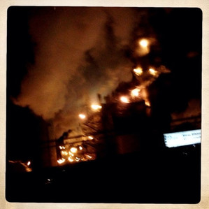 Smoke and lights at night coming from an industrial plant in New Jersey
