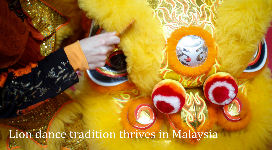Lion dance tradition thrives in Malaysia by Joshua Paul