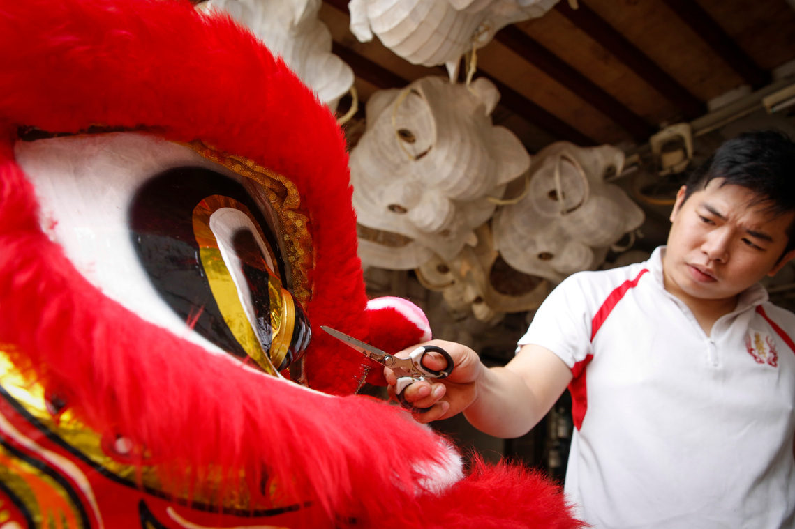 Lion dance tradition thrives in Malaysia by Joshua Paul