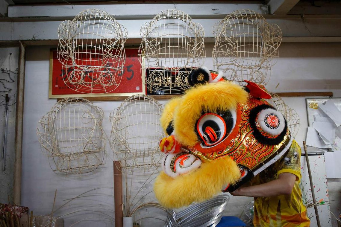 Lion dance tradition thrives in Malaysia by Joshua Paul
