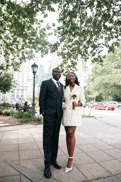 Manhattan City Hall Wedding Photography: Capturing candid moments and genuine emotion for couples saying "I do" in NYC. Your love story, beautifully told.