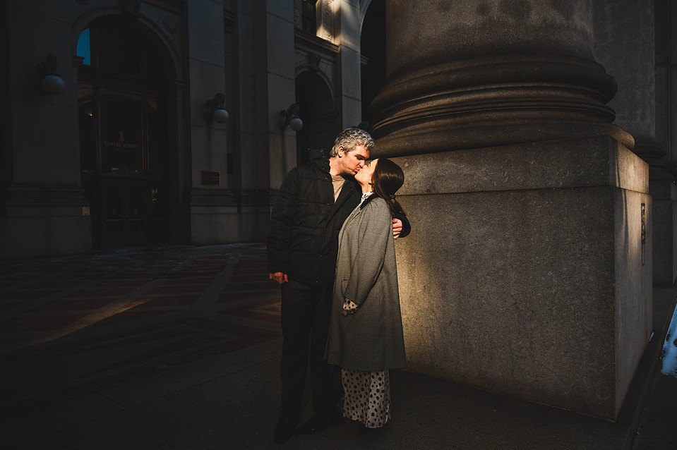 Wedding couple walking outside the David N. Dinkins Manhattan Municipal Building