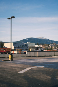 A view across downtown Nanaimo to snow-capped Mount Benson.