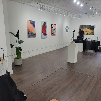 a wide shot of the full length of the 40 foot tape loop that extends through the gallery space. 