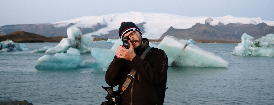 Perky Pug Films chief Peter, filming a wedding film on Iceland glacier Jökulsárlón nearby a Diamond beach. 