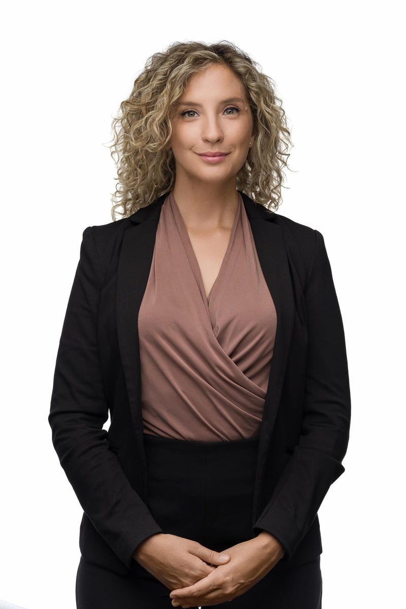 Corporate headshot for a banker on a white background