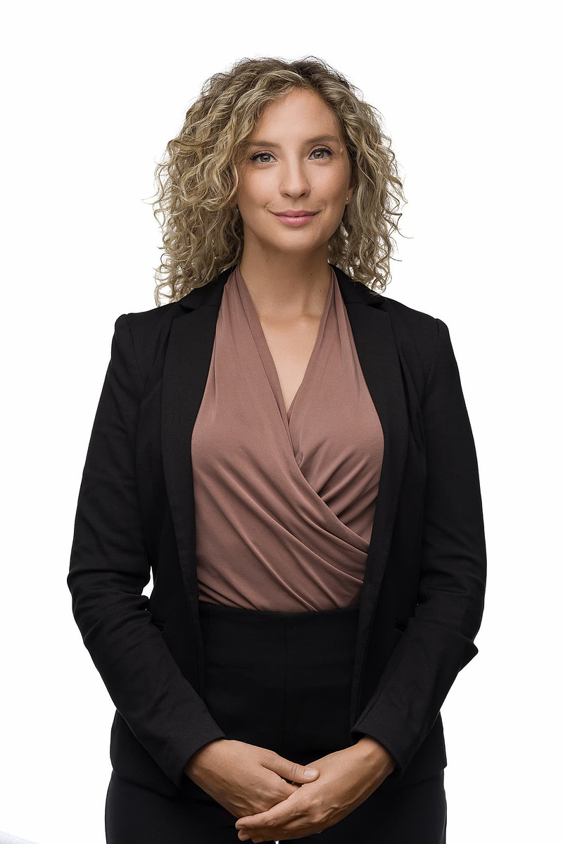 Corporate headshot for a banker on a white background