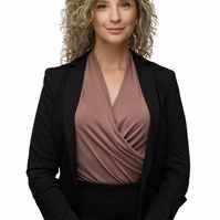 Corporate headshot for a banker on a white background