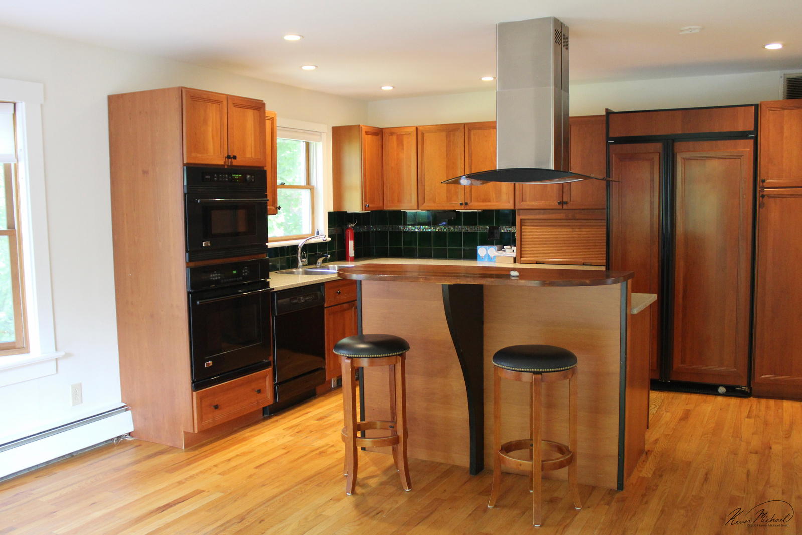 Real Estate Photography, in Westchester County, New York by Vermont-based Artist & Photographer, Kevin Michael Smith. Photo of spacious kitchen with hardwood floors.
Rutland Photographer.
