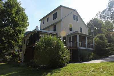 Real Estate Photography, in Westchester County, New York by Vermont-based Artist & Photographer, Kevin Michael Smith. Exterior photo of a house and backyard.
Rutland Photographer.
