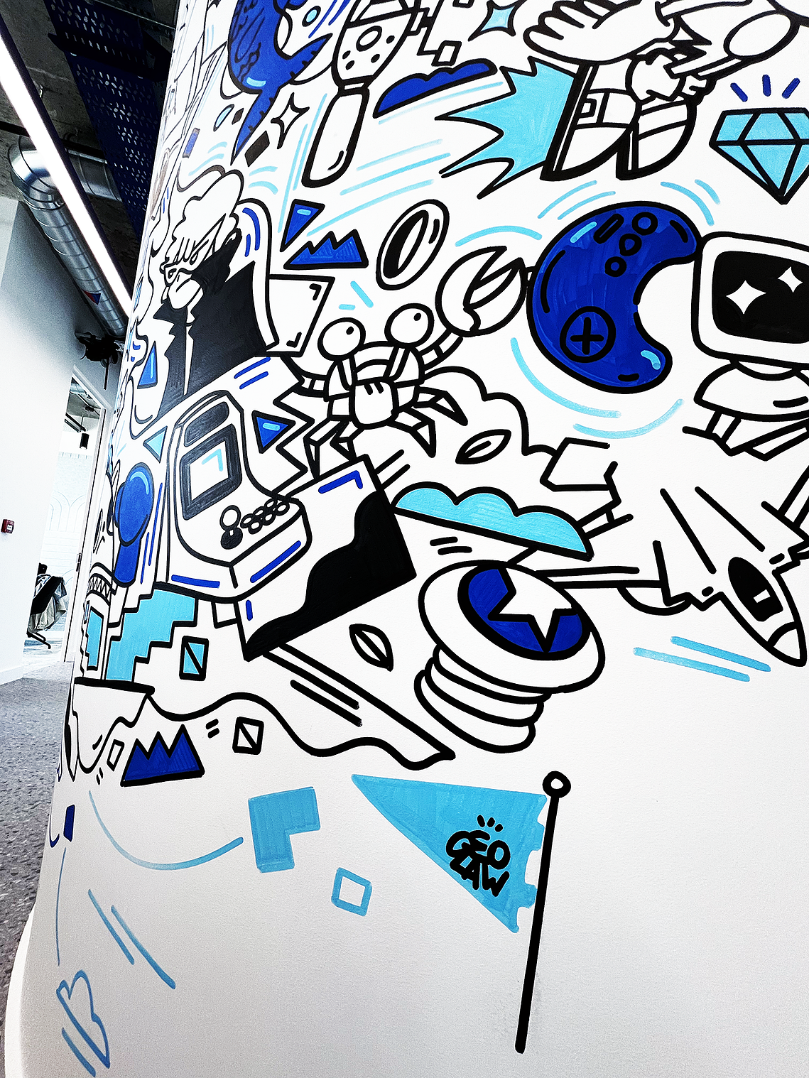 Illustrator Geo Law doodles a mural for Sega Europe in London featuring characters like Sonic the Hedgehog, Shinobi, Streets of Rage and more