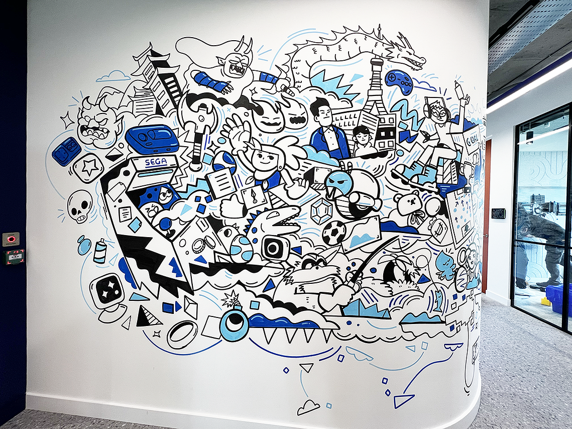 Illustrator Geo Law doodles a mural for Sega Europe in London featuring characters like Sonic the Hedgehog, Shinobi, Streets of Rage and more